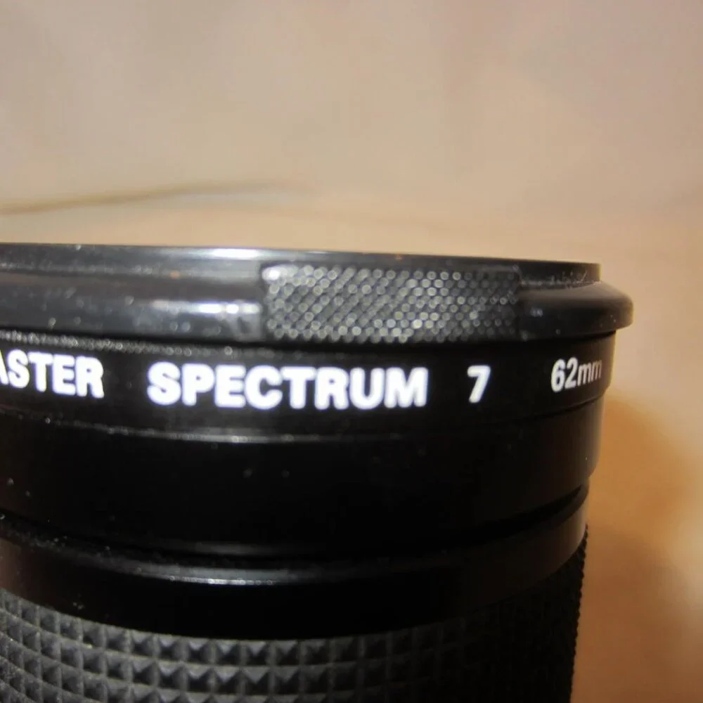 VIVITAR 28-85 mm macro zoom lens with Spectrum 7 filter